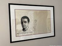 Full view of framed mixed media artwork on wall