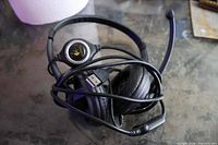 Headset coiled showing earcups, boom mic and USB plug
