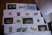 Overview of several stock cards showing assorted mint Canadian stamps
