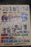 Full view of first stock sheet showing Staffa and Nagaland cancelled stamps in pockets