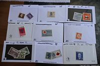 Overview of eight of the nine stock cards with Canadian mint hinged stamps