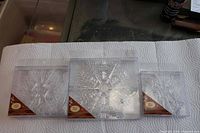 Three boxed clear snowflake ornaments