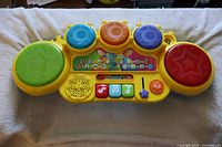 Front view of complete VTech drum set showing all pads and controls