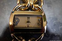 City Lisung watch face showing cream dial, crystal numerals 9 and 3