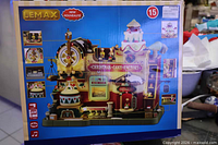Front of retail box showing animated building image and brand