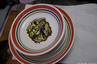 Stacked view of large bowl with four smaller bowls