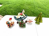 Group shot of all five Christmas décor items on table