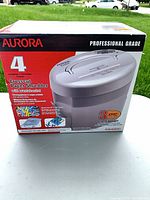 Front of box showing Aurora AS420C crosscut shredder image and specifications