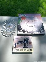 Overall lot showing glass bowl, platter box and corkscrew box