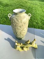 Overall shot of vase and figurine together