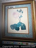 Front view of framed botanical rose print showing artwork, mat and ornate gold frame