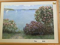 Full view of framed print showing coastal scene and frame