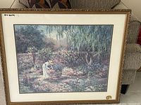 Full view of framed print showing artwork, mat, and ornate frame