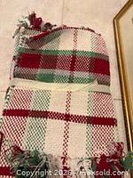 Plaid cotton throw showing weave and fringe
