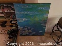 Front view of entire acrylic painting leaning against wall