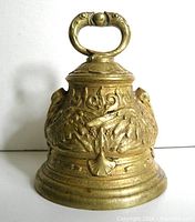Full view of brass bell front showing overall design and size
