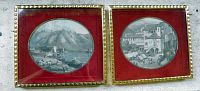 Both framed etchings side by side