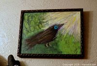 Front view of framed acrylic painting on wall