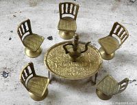 Complete brass miniature set arranged on surface