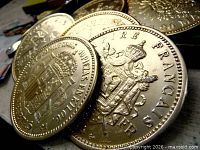 Close-up of coin replica metal coasters