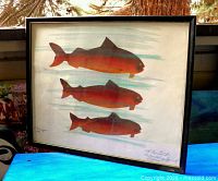 Front view of framed watercolor showing three salmon and signature