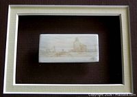 Front view showing piano key art within double mat and frame