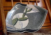 front view showing full decorative surface and shape