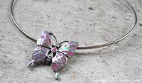 Overall view of choker with butterfly pendant attached