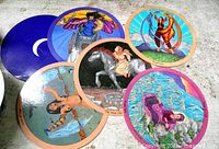 Five sampled round tarot cards and card back shown