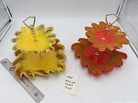 Both two-tier leaf trays side by side with ruler for scale