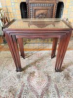 Largest table full view showing glass inset top, legs, apron