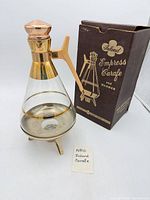 Carafe, warmer stand, and box full view