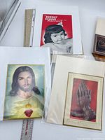 Prints of Jesus, praying hands, Sunday School booklet