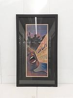 Full frontal view of framed print showing artwork, frame, scale