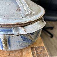 Side view showing pot, lid, glaze and brushwork