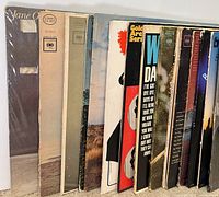 Row of LP records standing, spines visible with assorted Columbia and other labels