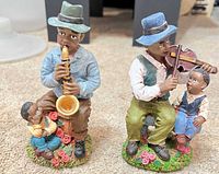 Both musician figurines front view