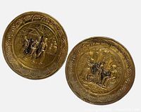 Both brass plaques front view
