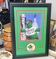 Front view showing entire framed, matted photograph with logo medallion