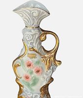 Full view of ornate porcelain decanter with stopper