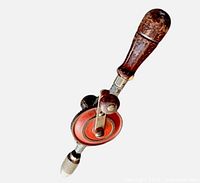 Full view showing wood handle, crank and chuck