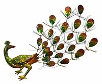 full view of colourful metal peacock sculpture with fanned tail
