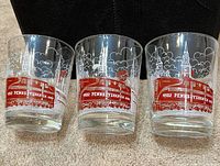 Front view of all three glasses displaying locomotive and skyline print