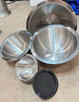 All four nested stainless steel bowls with lid