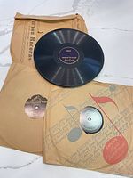 Overview of three records and Eaton’s sleeves