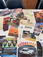Top view of assorted brochures and ads spread on table