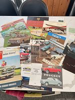 All brochures spread out on table