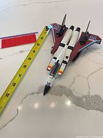 Top view of Ramjet figure with measuring tape
