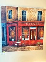 Front view of entire canvas showing cafe scene and overall condition