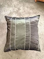 front view of square striped pillow